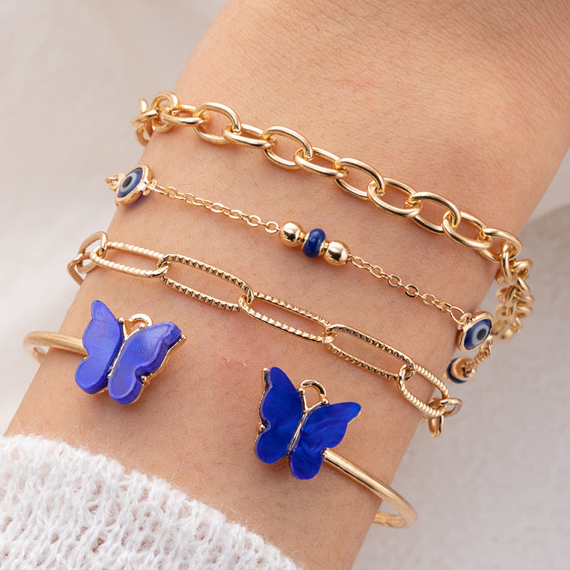 Elegant Blue Butterfly Four-Layer Bracelet with Diamond Detailing