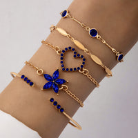 Elegant Blue Butterfly Four-Layer Bracelet with Diamond Detailing